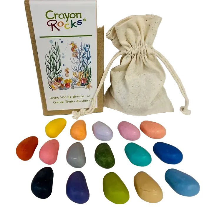 Crayon Rocks box with 16 different colored rock-shaped crayons next to a muslin bag on a white background