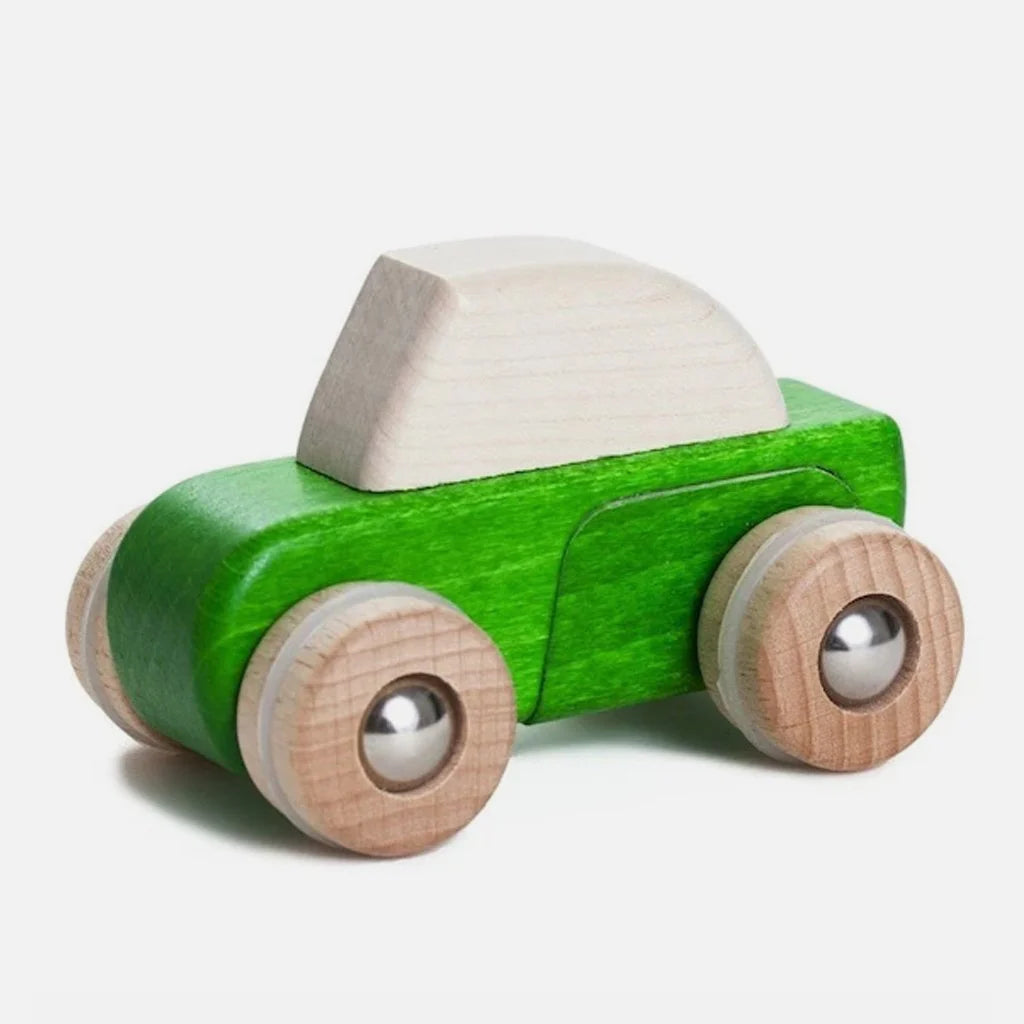 Green wooden car with a white top on a white background
