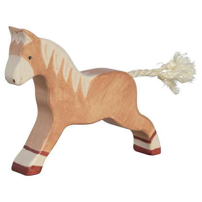 Wooden horse toy on a white background