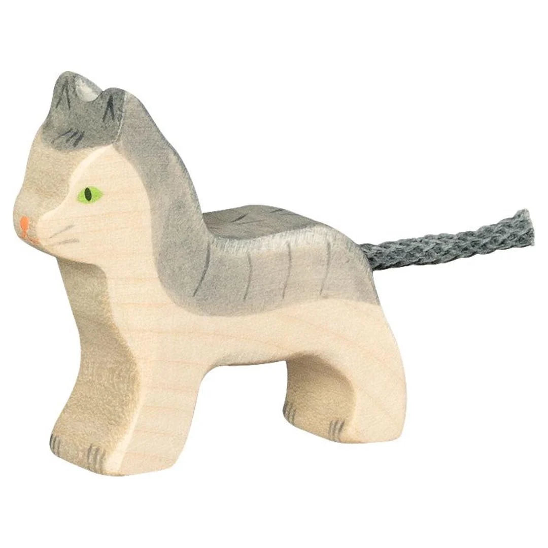 Wooden toy cat on a white background
