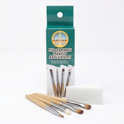 Four eco-friendly brushes and a sponge laid out in front of Natural Earth Paint branded packaging on a white background