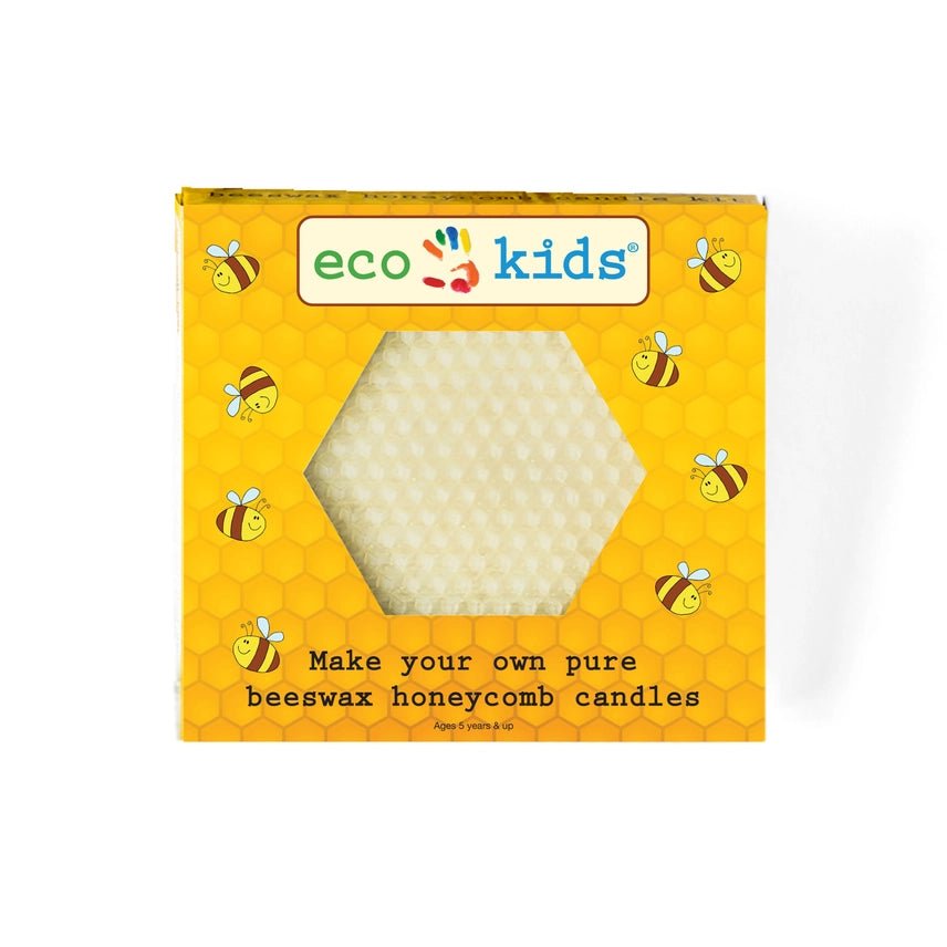 A square yellow box of eco kids beeswax honeycomb candles, featuring a hexagonal cutout window showing the white beeswax inside, with illustrations of bees and honeycomb patterns.