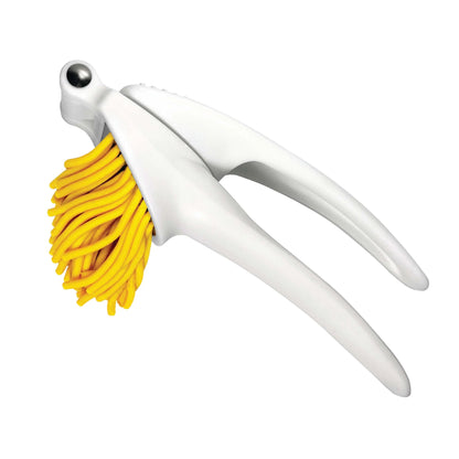 White eco-dough press with strings of yellow eco-dough on a white background