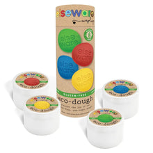 Set of gluten free eco-dough containers with colorful labels and a cardboard tube packaging on a white background.