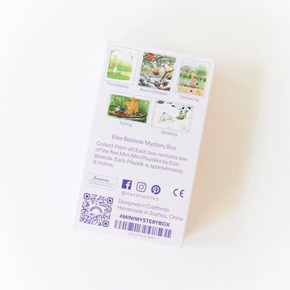 The back of a white Elsa Beskow Mystery Box card package, showing five small illustrated card previews on a white background.