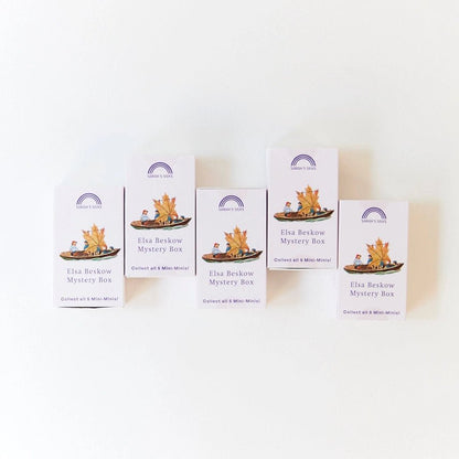 Five identical boxes of Elsa Beskow Mystery Box on a white background