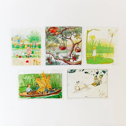 Set of five colorful illustrated playsilks on a white background
