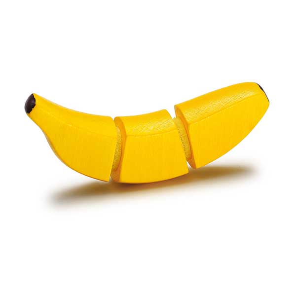 Wooden banana with velcro slices on a white background