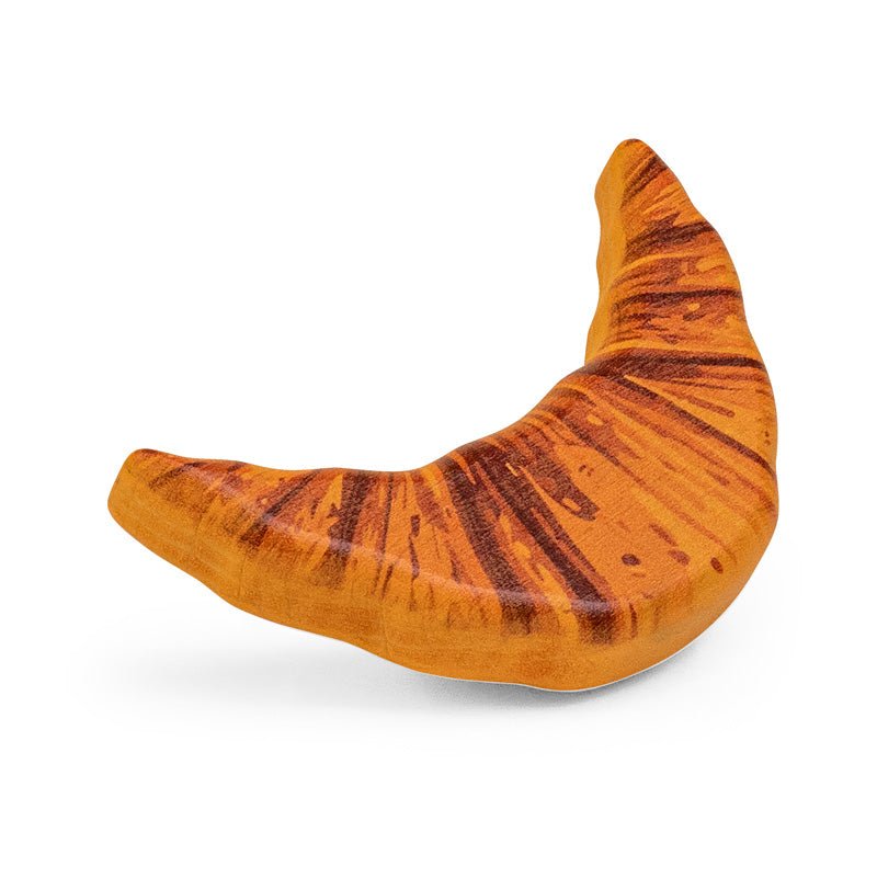 Wooden croissant on a white background