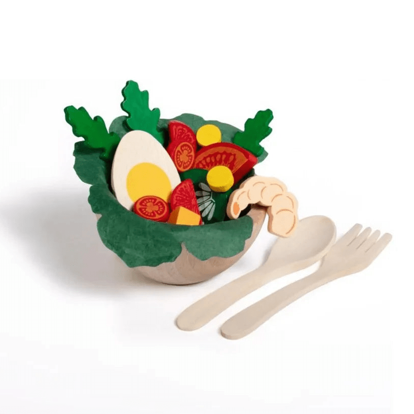 Wooden bowl of salad with spoon and fork on a white background