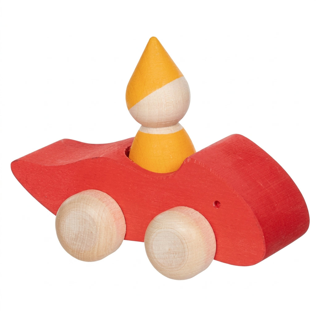 Red wooden vehicle with a yellow gnome peg person on a white background