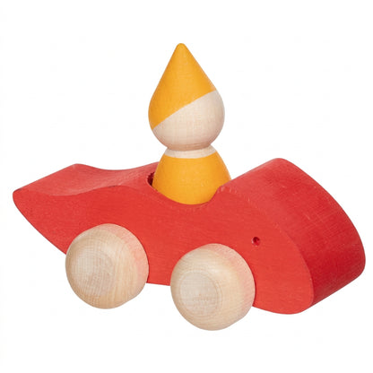 Red wooden vehicle with a yellow gnome peg person on a white background