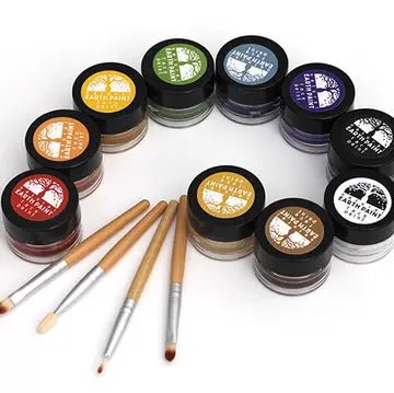 Set of face paint jars with Natural Earth Paint branding and paint brushes on a white background