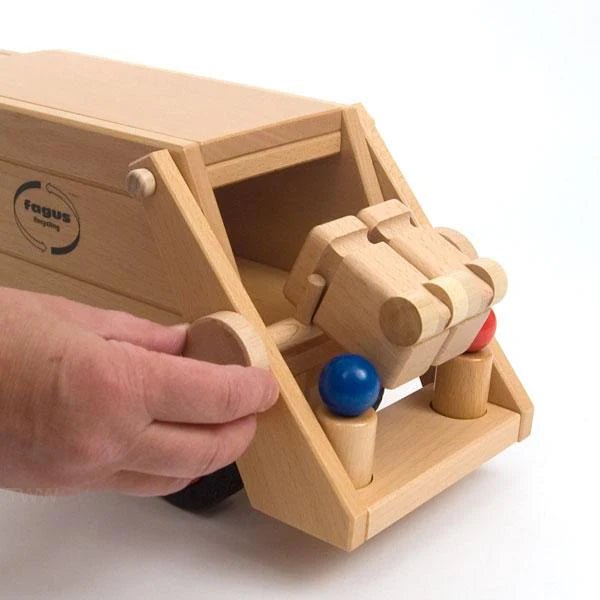 Fagus wooden recycling truck with hand showing garbage can movement on a white background