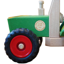Wooden green tractor with limited edition stamp