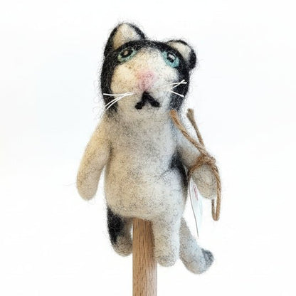 Black and white cat finger puppet on a white background