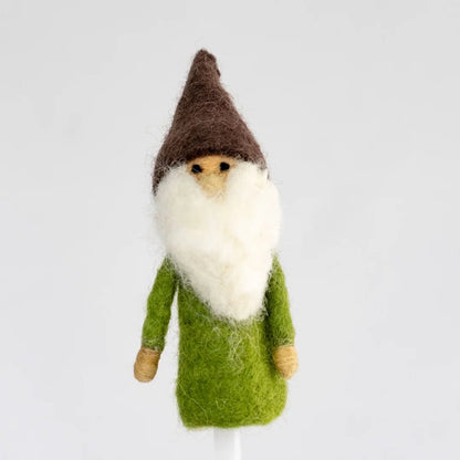 Felted gnome finger puppet with a brown hat and green tunic on a white background