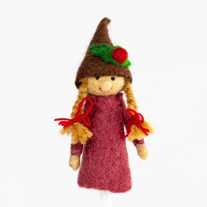 Gnome finger puppet with brown hat and red dress on a white background