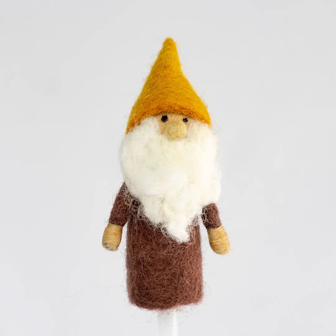Felted gnome finger puppet with a yellow hat and brown outfit on a white background