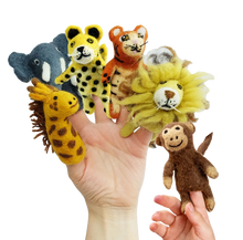 Set of colorful animal finger puppets on a hand against a white background