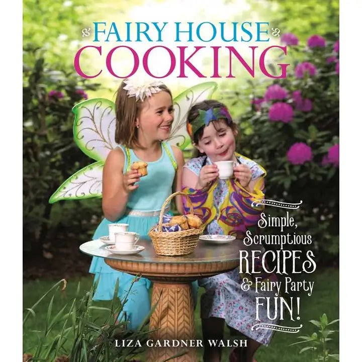 Book cover of 'Fairy House Cooking' with two children in fairy costumes outdoors.