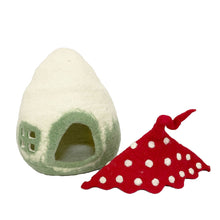 Green and cream-colored felt mushroom cave next to removeable red-polka dot roof on a white background