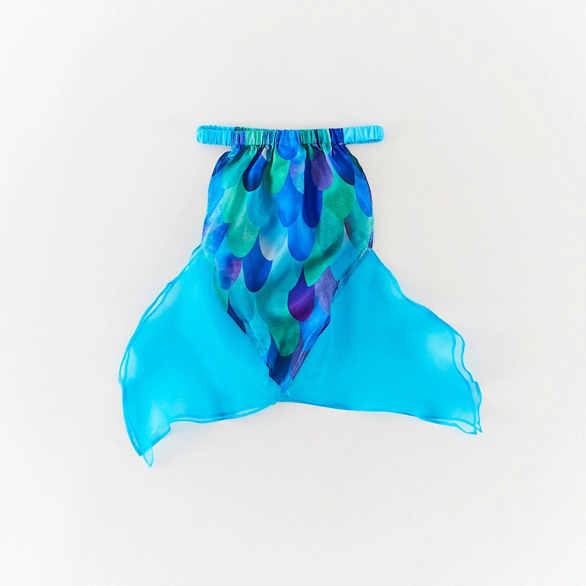 Silk mermaid skirt with green, blue, and teal scales and blue fins on a white background