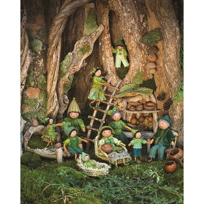 Gnome figurines in a forest setting with a treehouse and various gnome activities.