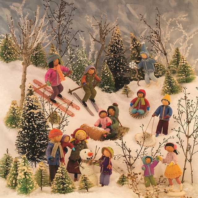 Illustration of children playing in a snowy landscape with trees and a snowman.