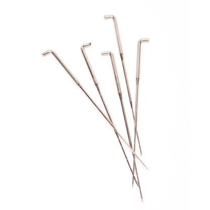 Five felting needles on a white background