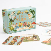 Children's card game with fairy-themed cards and box on a white background