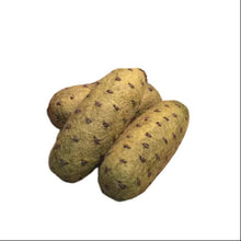 3 felted pickles on a white background