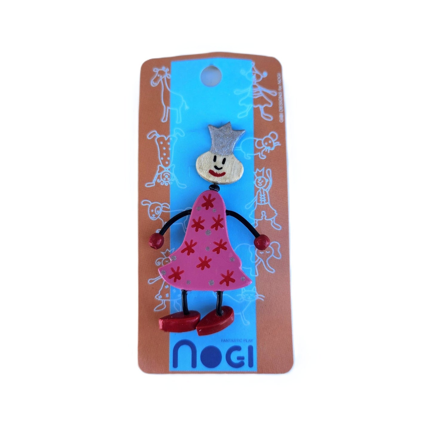 Wooden pin of a clown wearing a pink dress with red stars and a silver crown on Nogi branded packaging