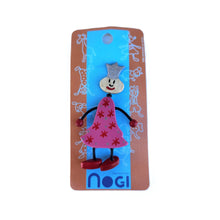 Wooden pin of a clown wearing a pink dress with red stars and a silver crown on Nogi branded packaging