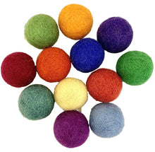 Pile of 12 felt balls in different colors 