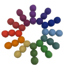 36 felt balls in 12 idfferent colors arranged in a circle on a white background