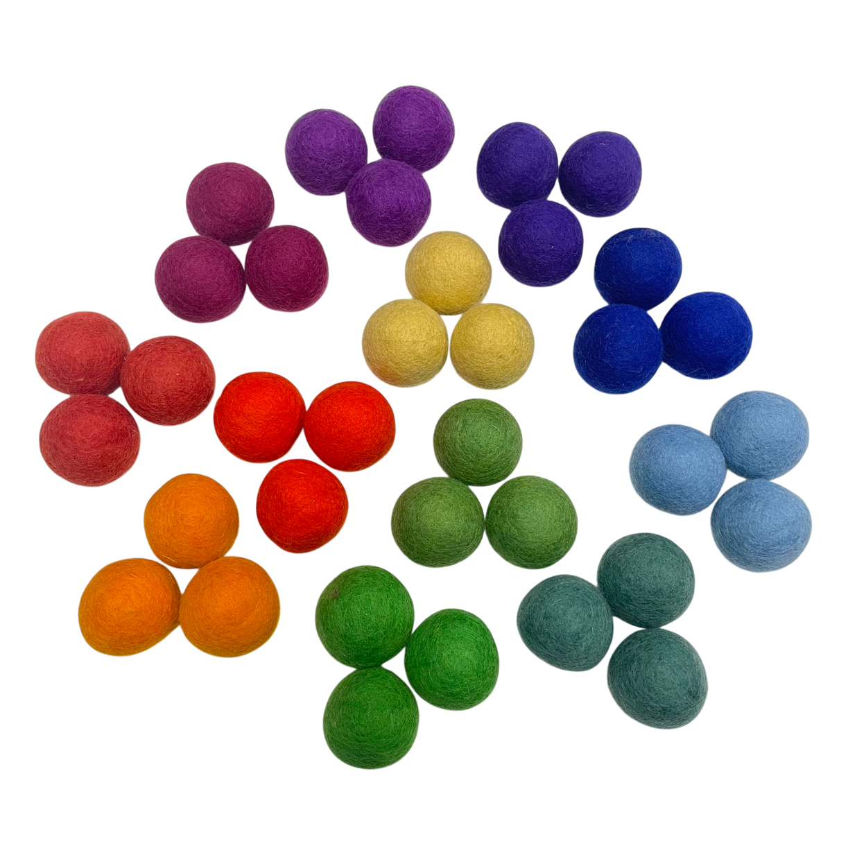 36 felt balls in the 12 colors of the color wheel on a white background