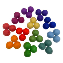 36 felt balls in the 12 colors of the color wheel on a white background