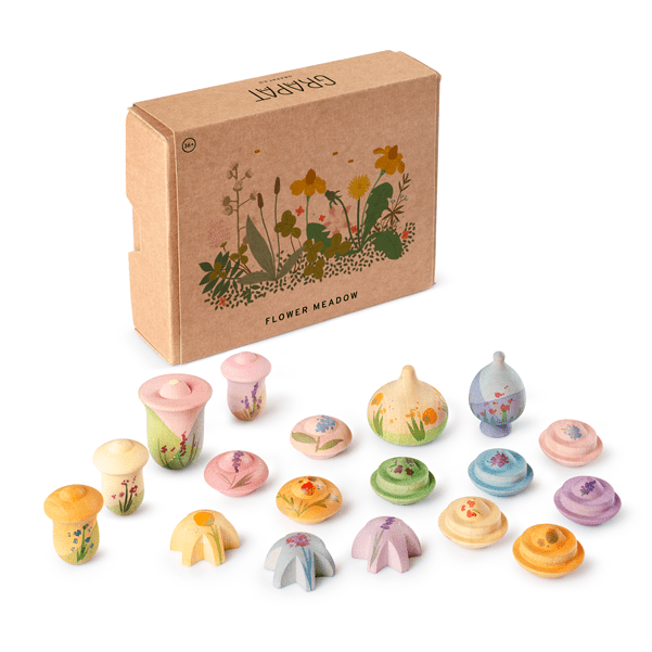 Set of wooden flowers with a Grapat Flower Meadow box on a white background