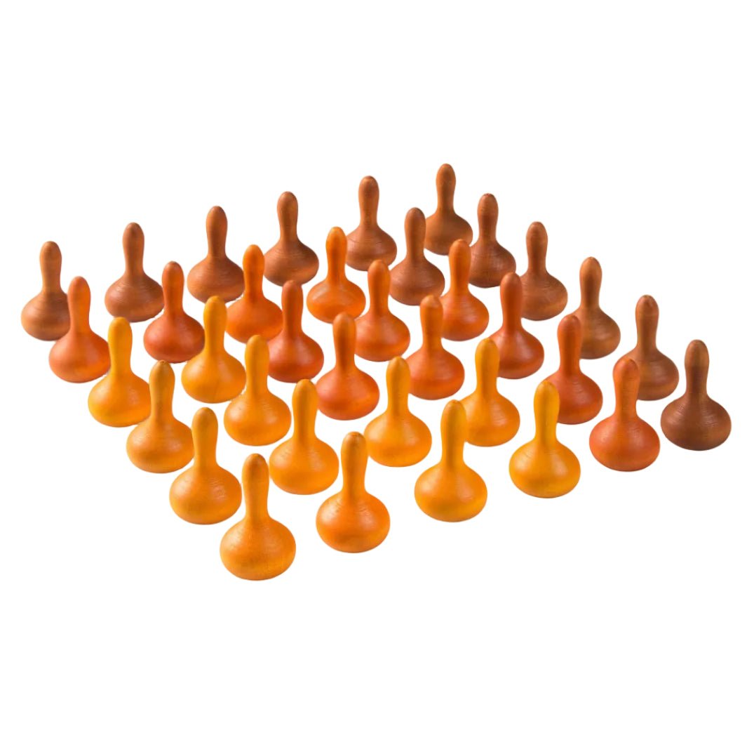 36 wooden play pieces in varying shades of orange on a white background