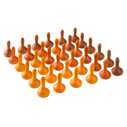 36 wooden play pieces in varying shades of orange on a white background