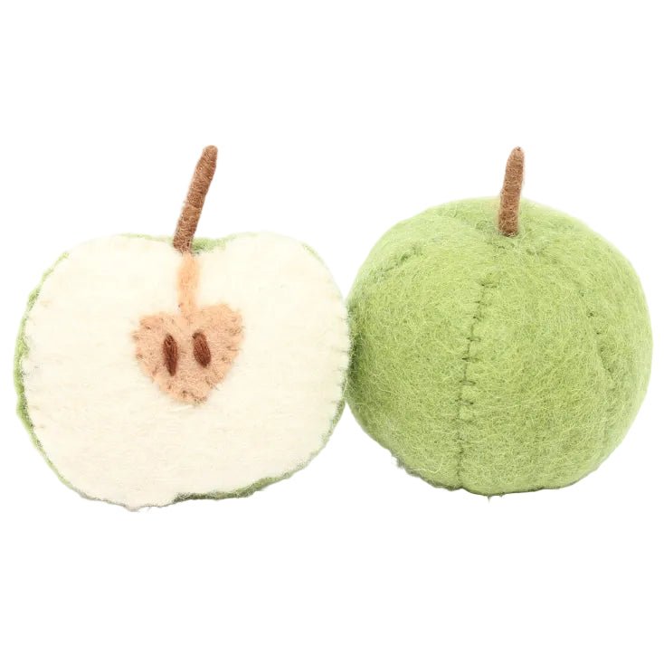 One half and one whole felted green apples on a white background