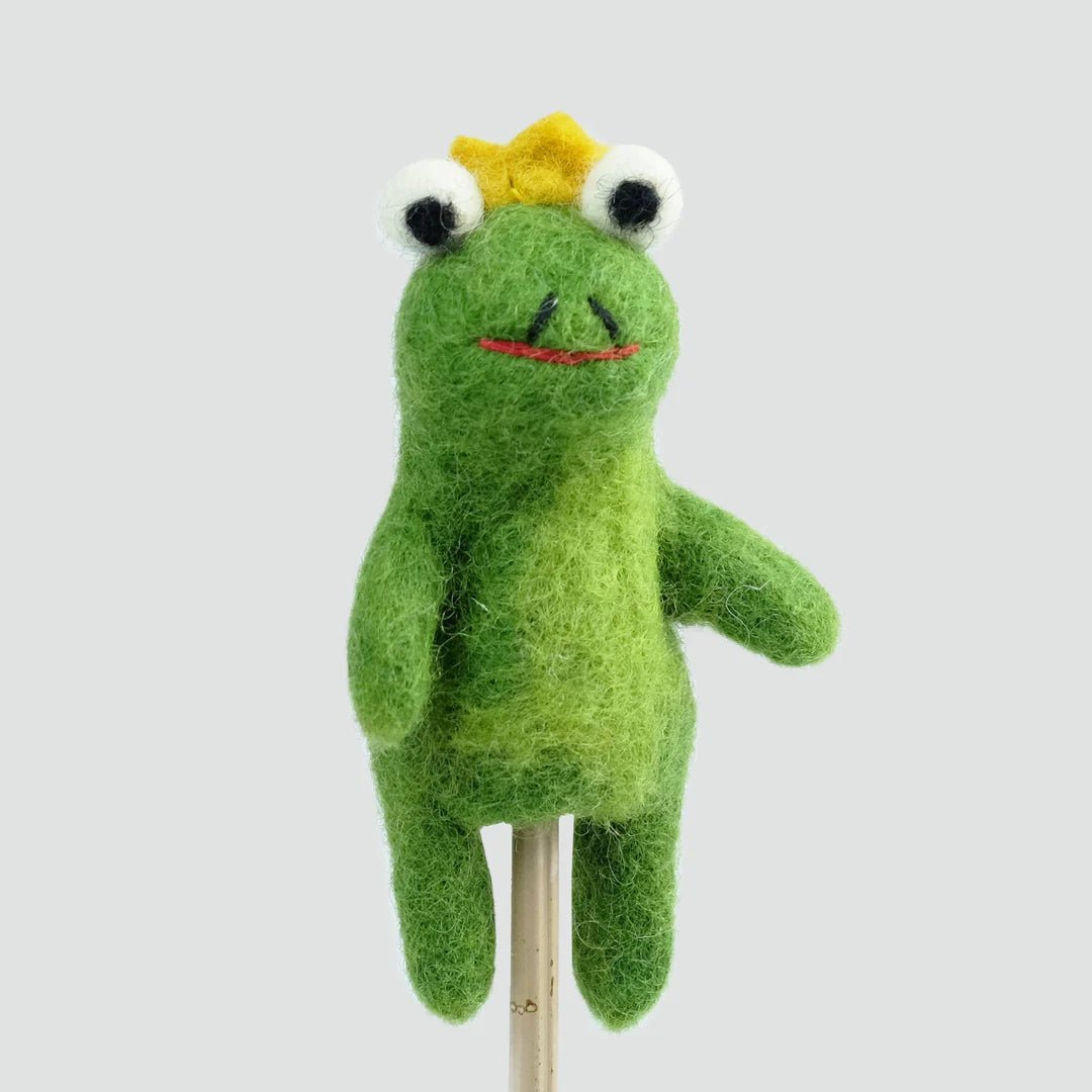 Green frog puppet with a yellow crown on a white background