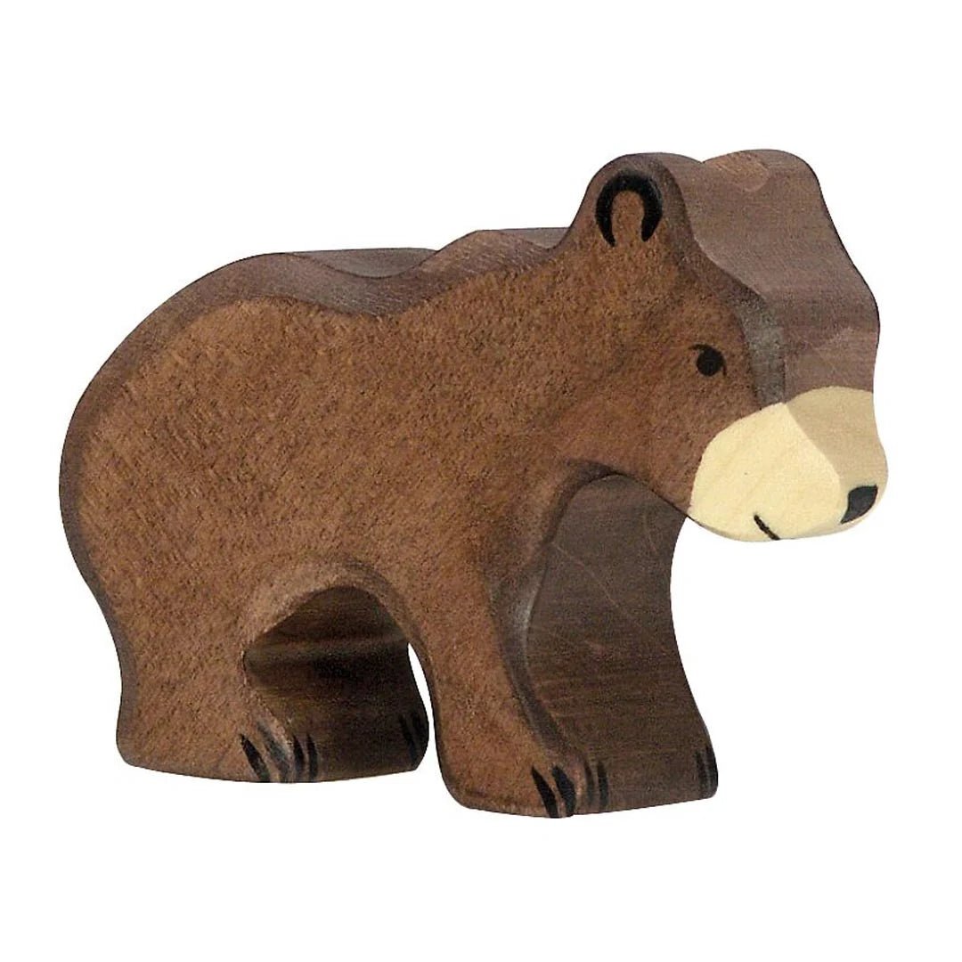 Wooden bear figurine on a white background