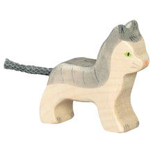 Wooden toy cat on a white background