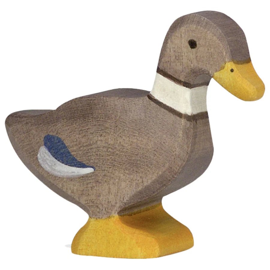 Wooden duck figurine with a brown body, yellow feet, and a blue and gray wing on a white background.