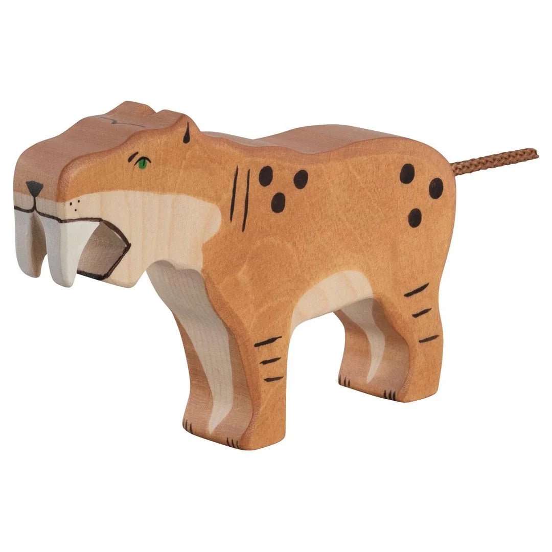 Wooden toy saber-toothed tiger figure on a white background
