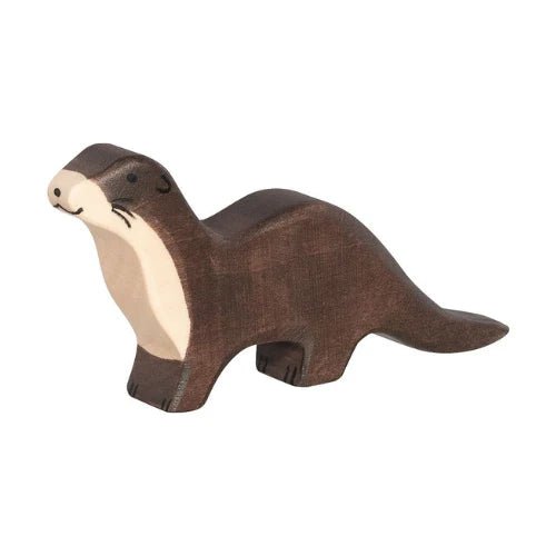 Wooden otter figurine on a white background