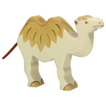 Wooden camel toy figure on a white background