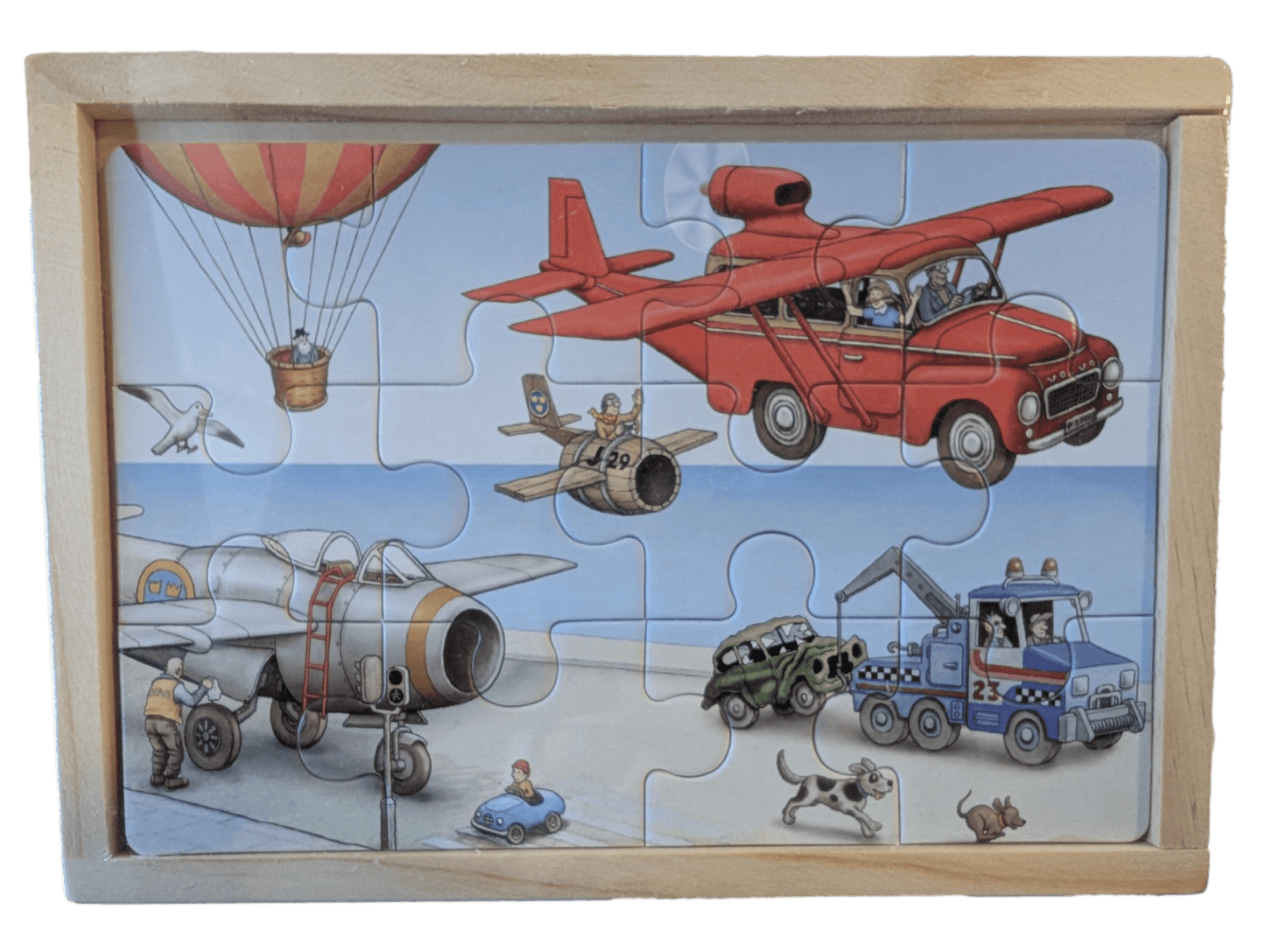 Children's puzzle illustrated by jan loof, with vehicles and a wooden frame